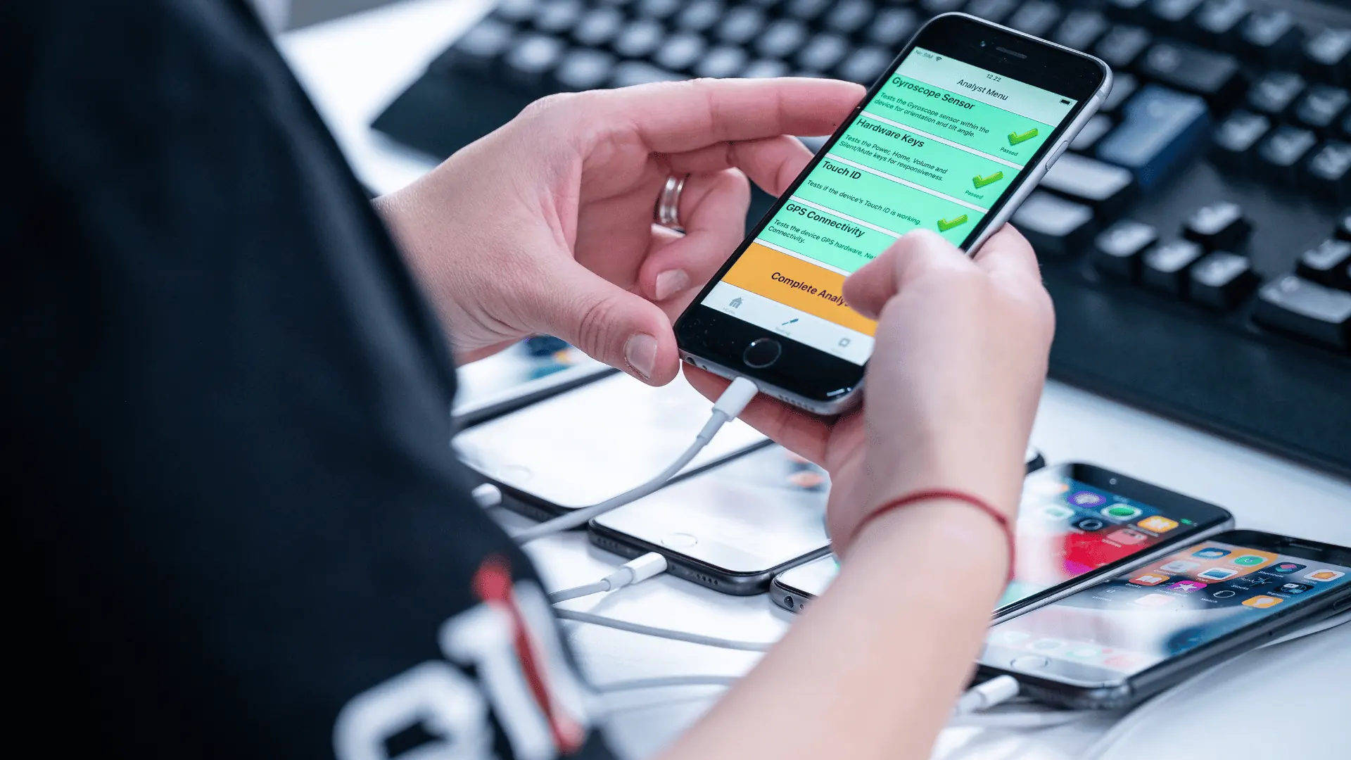 The Analyst Menu on a single handset listing gyroscope, hardware keys, Touch ID and GPS tests